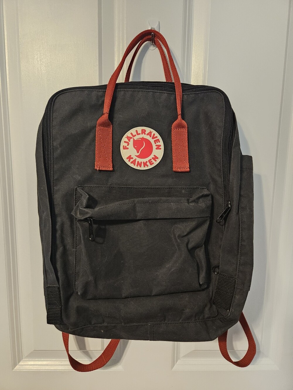 Fjallraven Kånken Black Backpack with Red Details